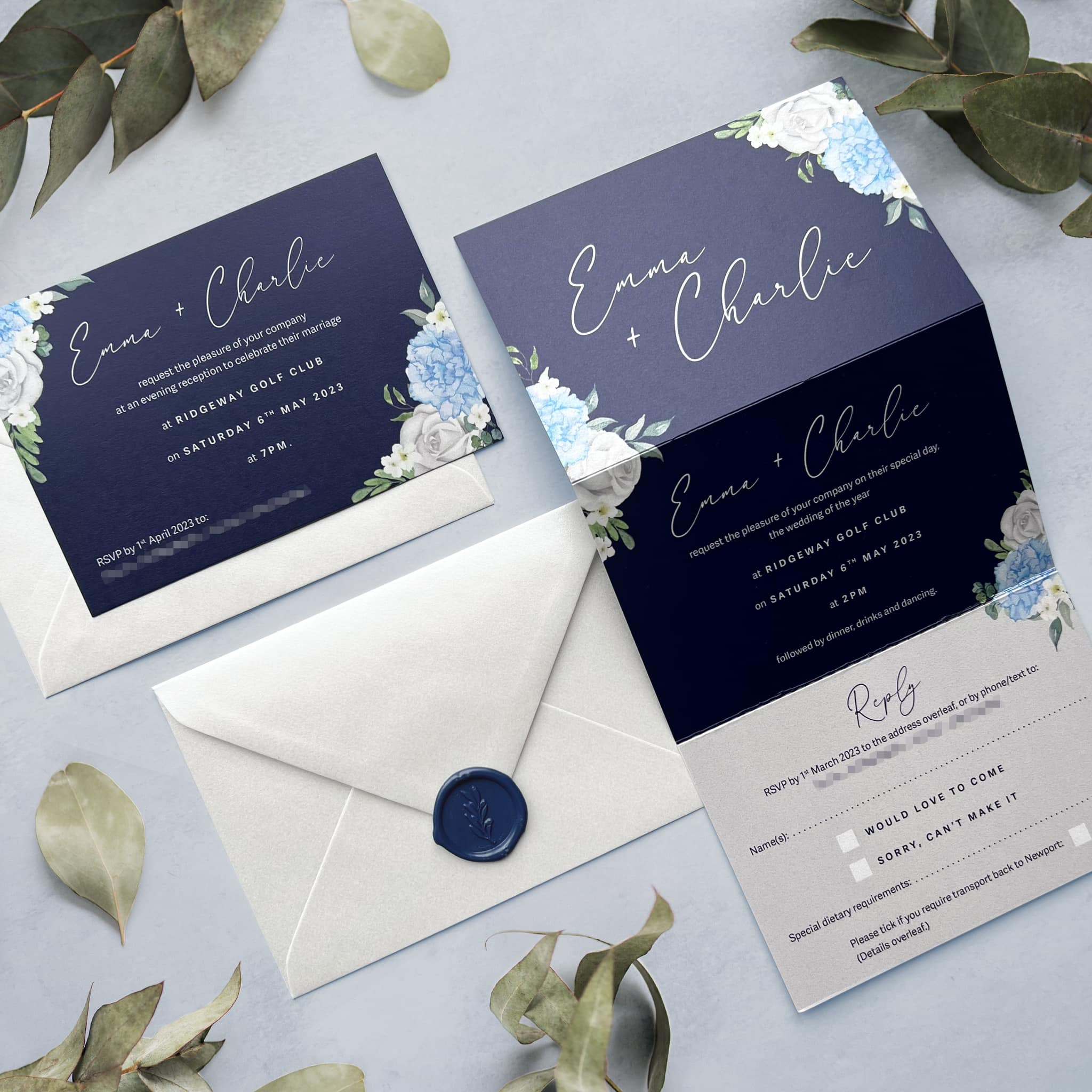 Navy concertina wedding invitation with blue and white florals.