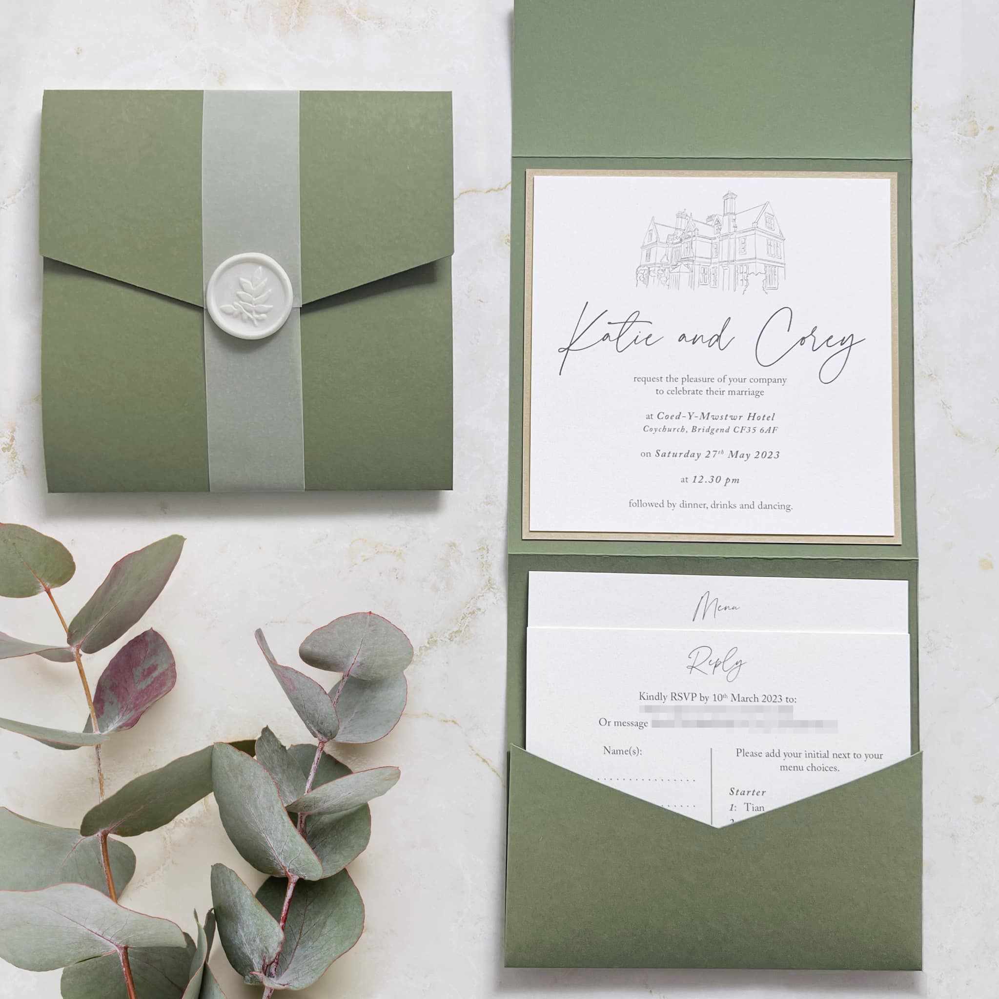 Green pocketfold invitation featuring a venue illustration of Coed y Mwstwr Hotel.