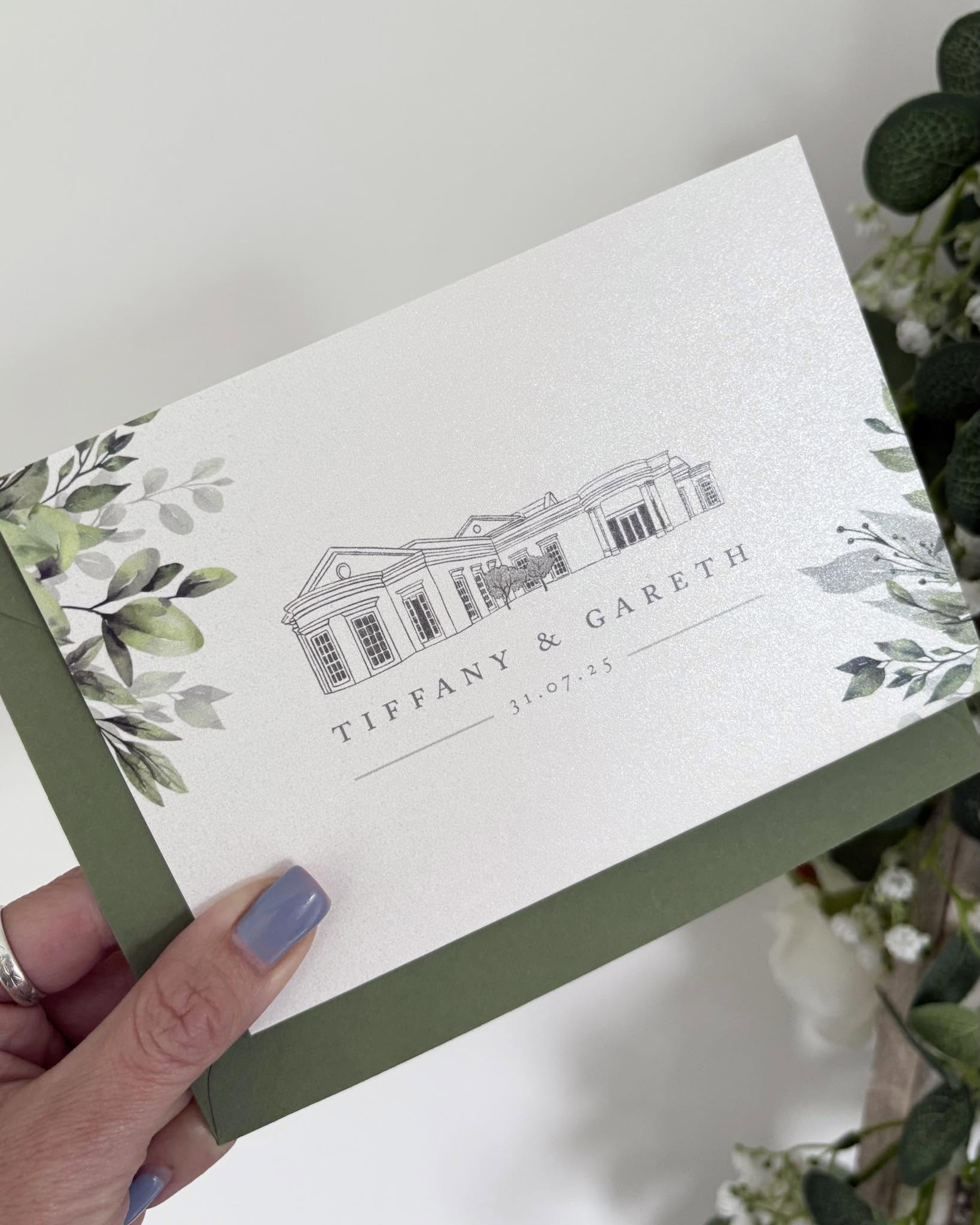 Green foliage concertina wedding invitation with venue illustration