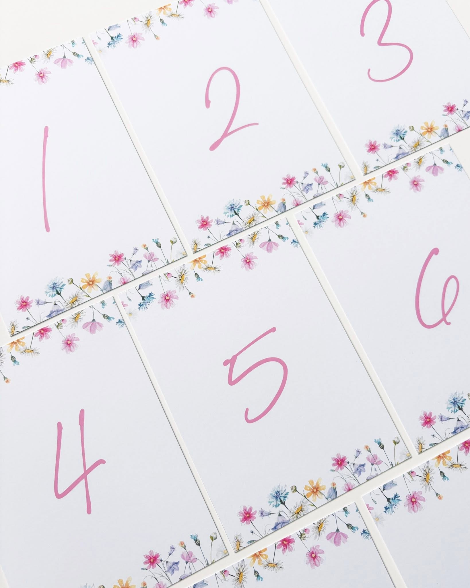 Pastel floral table number cards
